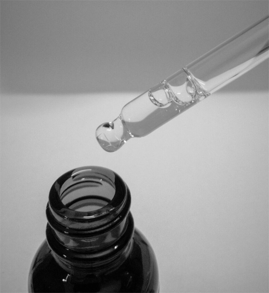 A glass bottle with liquid