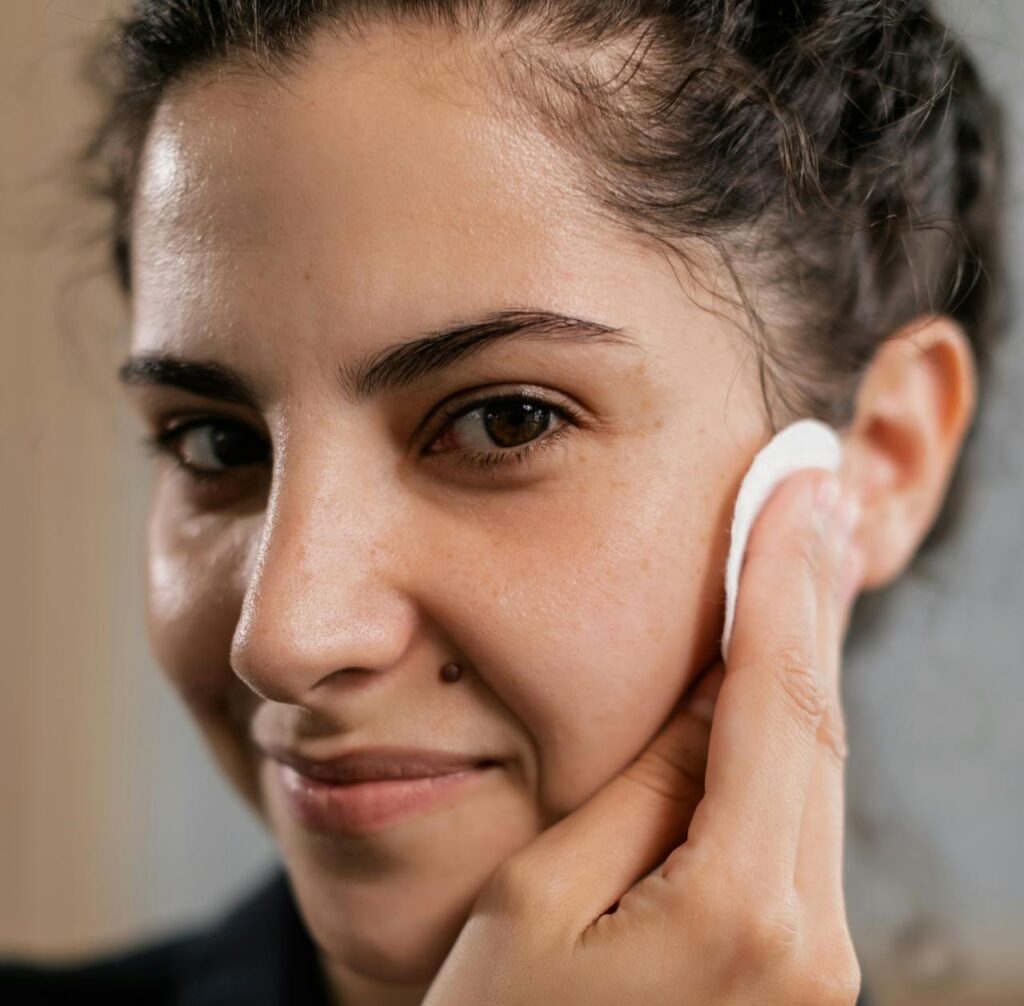 women using cotton pad